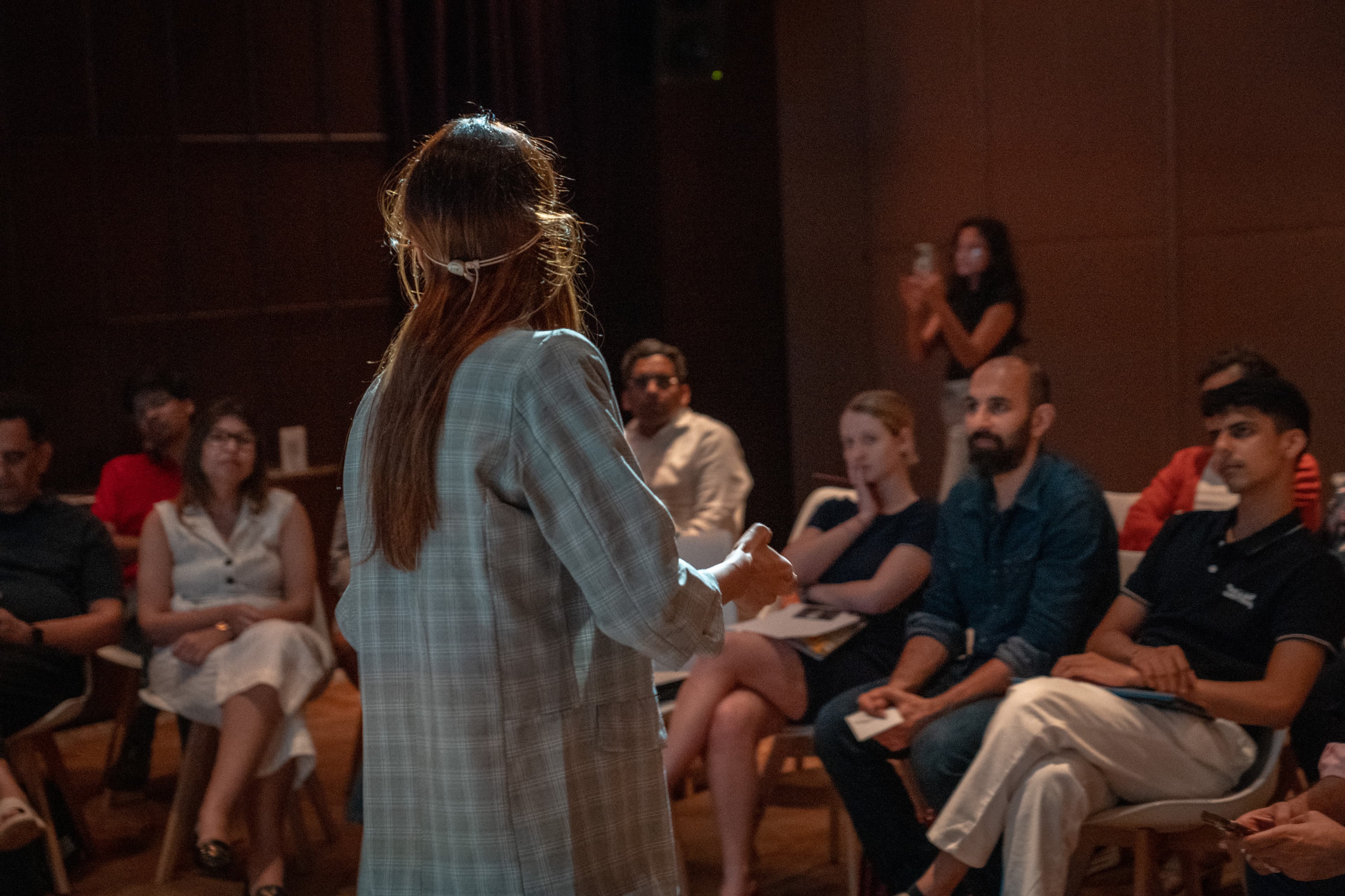 A facilitator speaking to participants during an SVYA session
