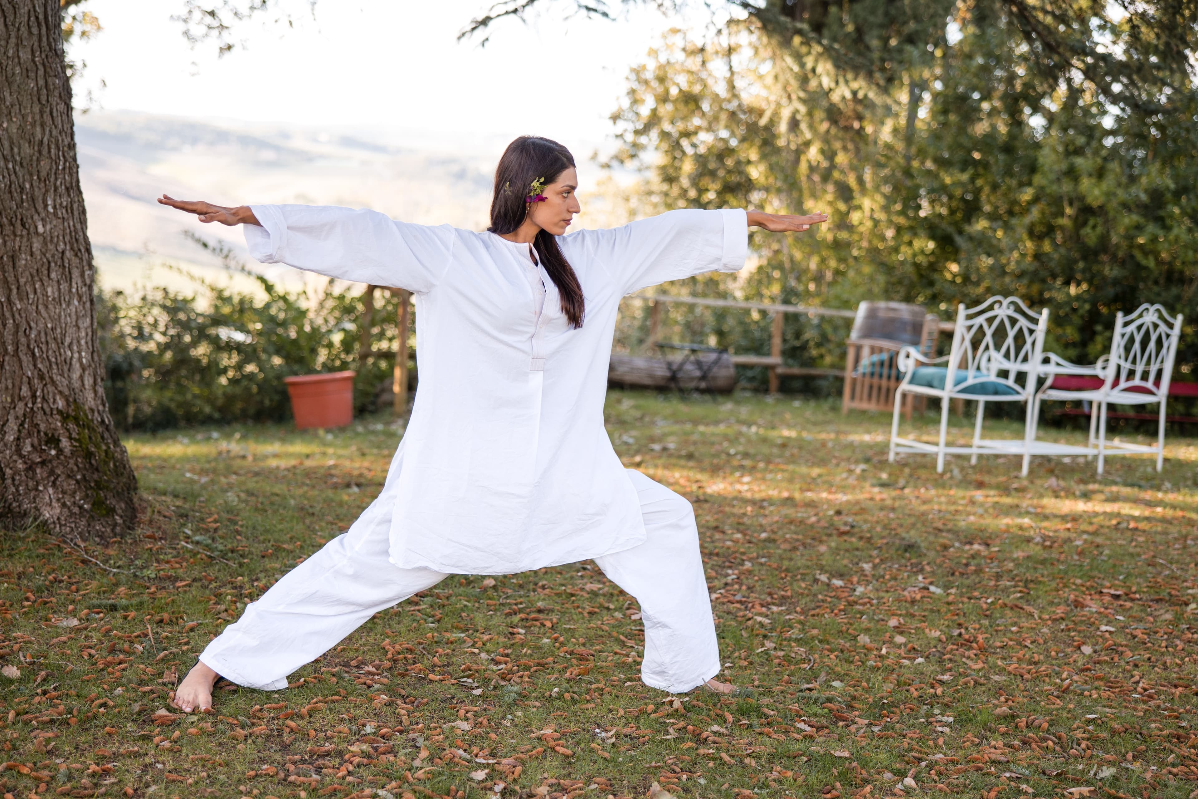 A yoga asana practice in a natural outdoor setting